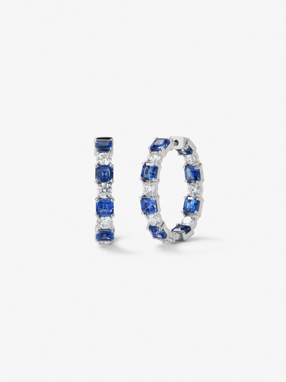 18K white gold earrings with 16 octagonal-cut blue sapphires with a total of 5.71 cts and 14 brilliant-cut diamonds with a total of 2.4 cts