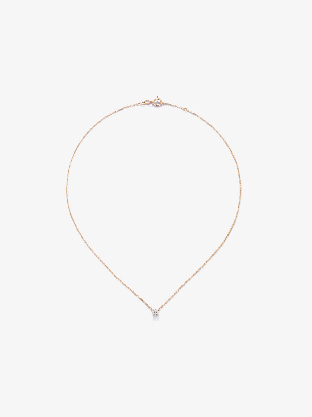 Colgante cadena de oro rosa de 18K con diamante solitario