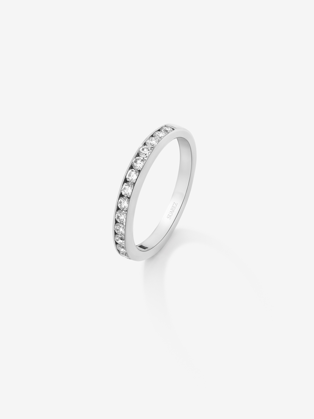 Half alliance 18K white gold engagement ring with diamonds on band.