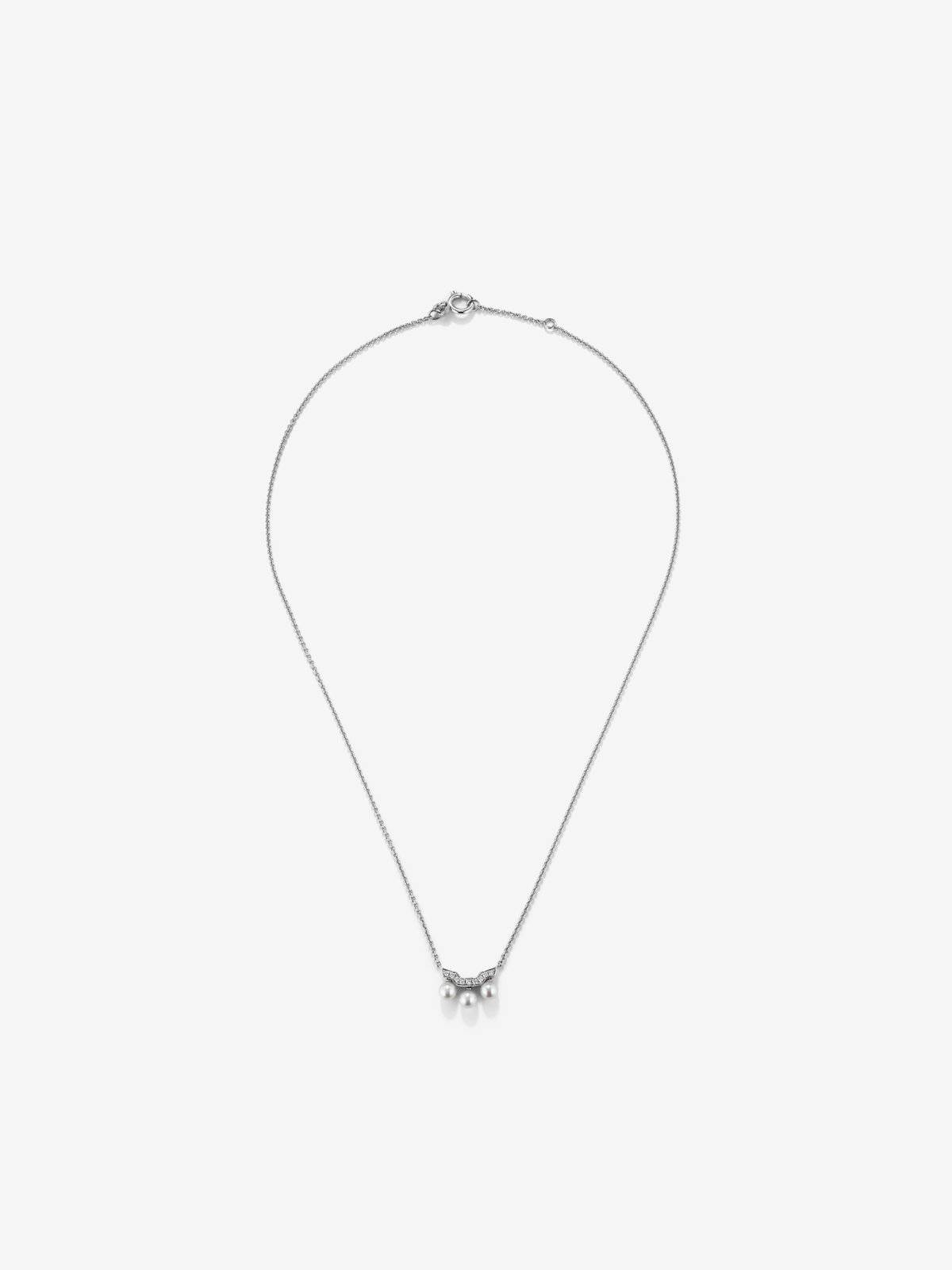 18k white gold pendant chain with three Akoya pearls and diamonds.