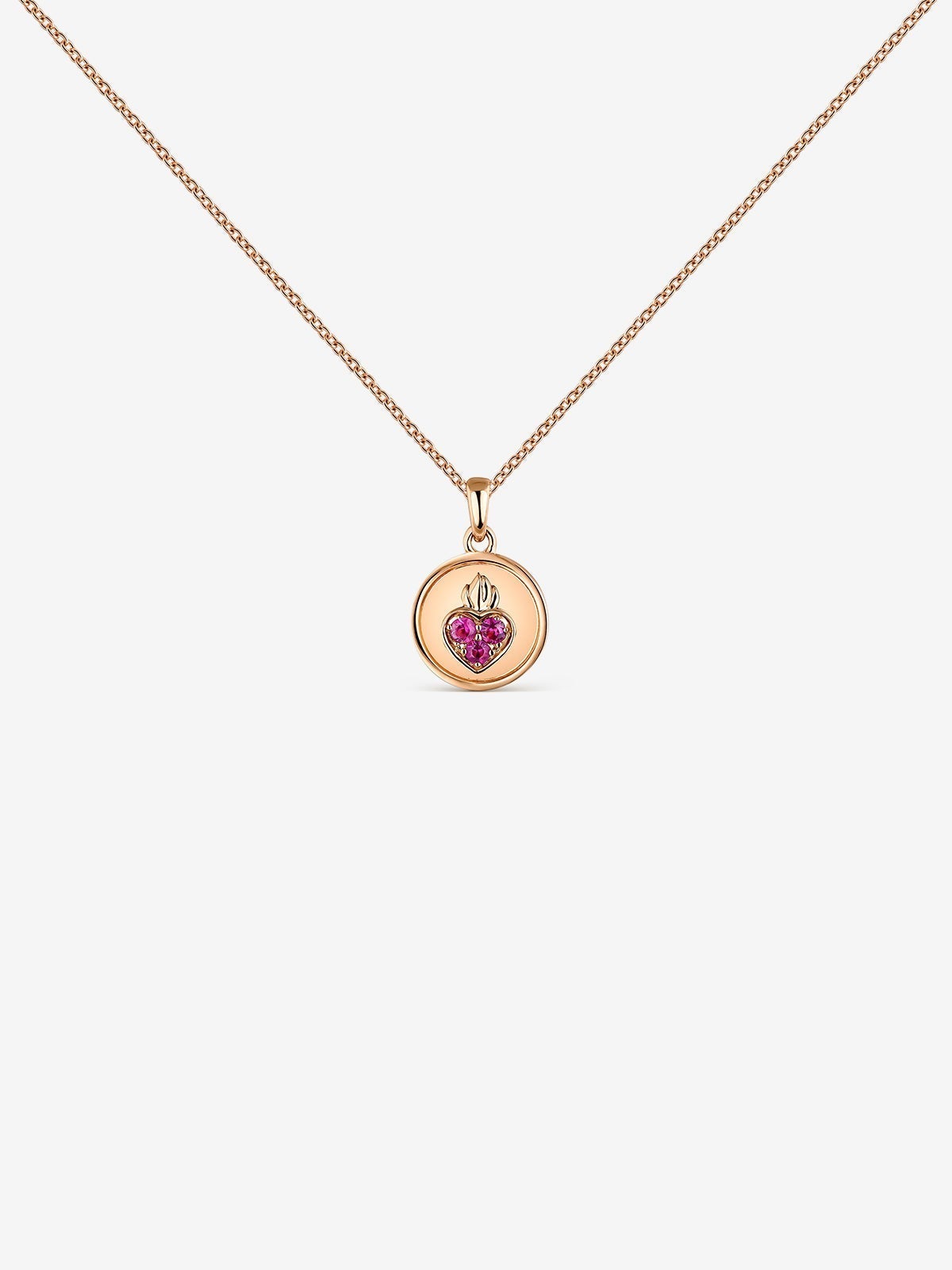 Colgante de oro rosa de 18kt con zafiros