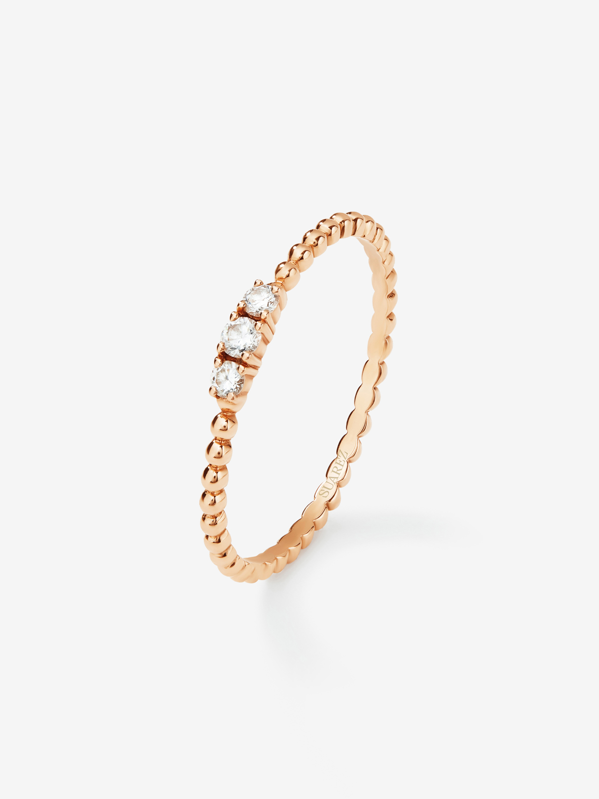 Anillo tresillo con bolitas de oro rosa de 18K con diamantes