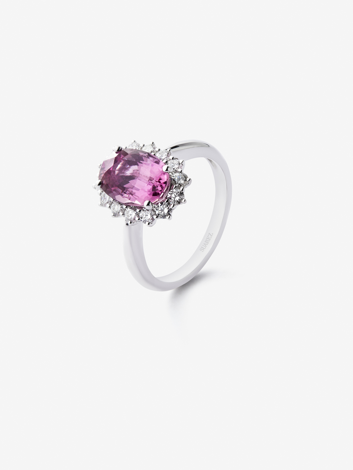 18K white gold ring with 3.4 ct oval-cut intense pink sapphire and 0.53 ct brilliant-cut diamonds
