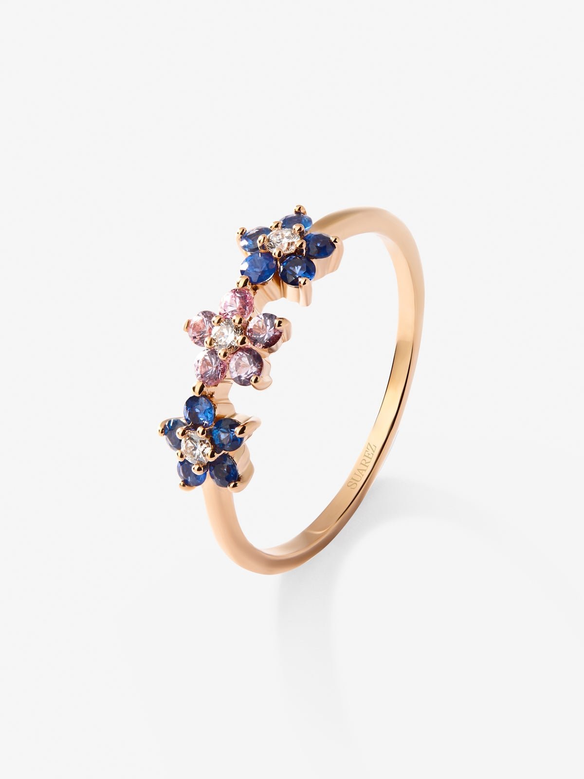 Anillo flores de oro rosa de 18kt con diamante y zafiros