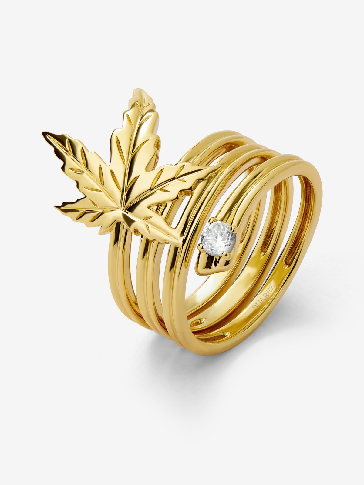 Anillo de oro amarillo de 18K con diamante en talla brillante de 0,10 cts y forma de hoja de arce
