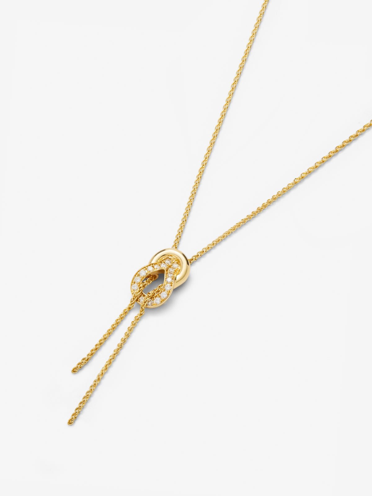 18K yellow gold pendant with 26 brilliant-cut diamonds with a total of 0.16 cts and a knot shape