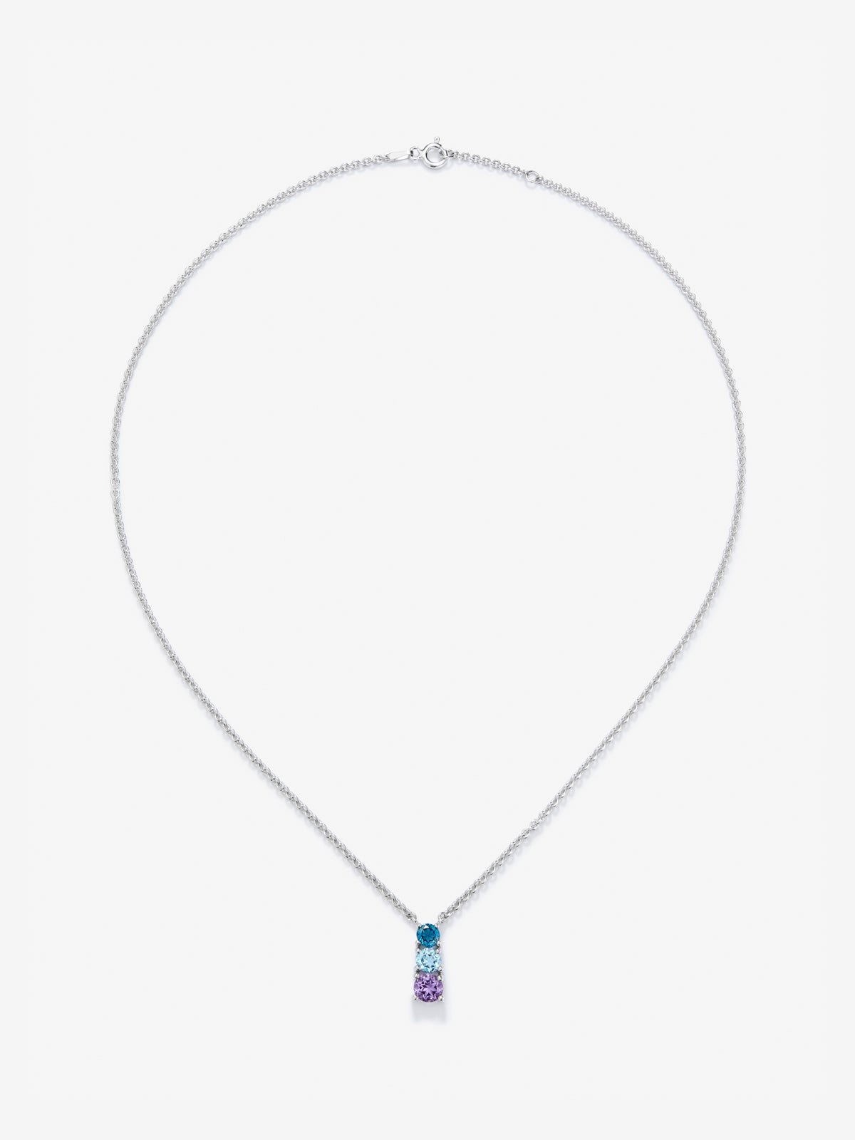 Colgante de plata 925 con topacio azul london, topacio azul swiss y amatista morada en talla brillante