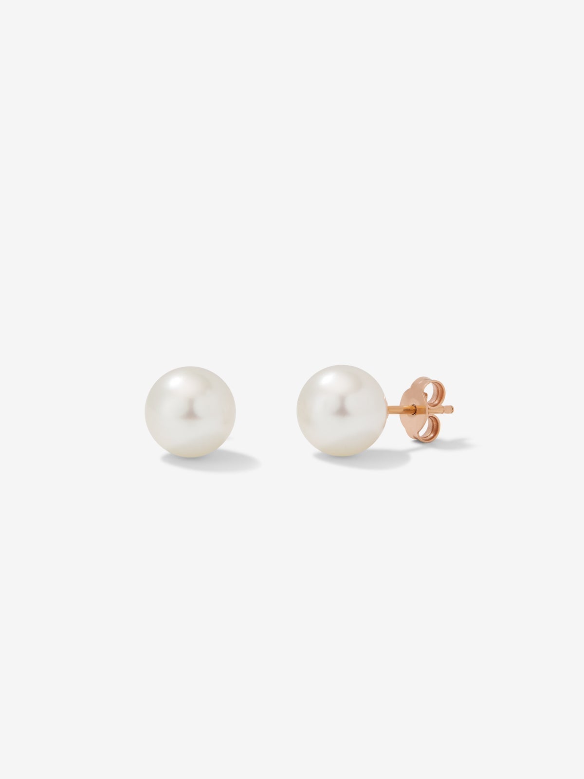 Pendiente de boton de oro rosa de 18k con perla australiana de 10 mm