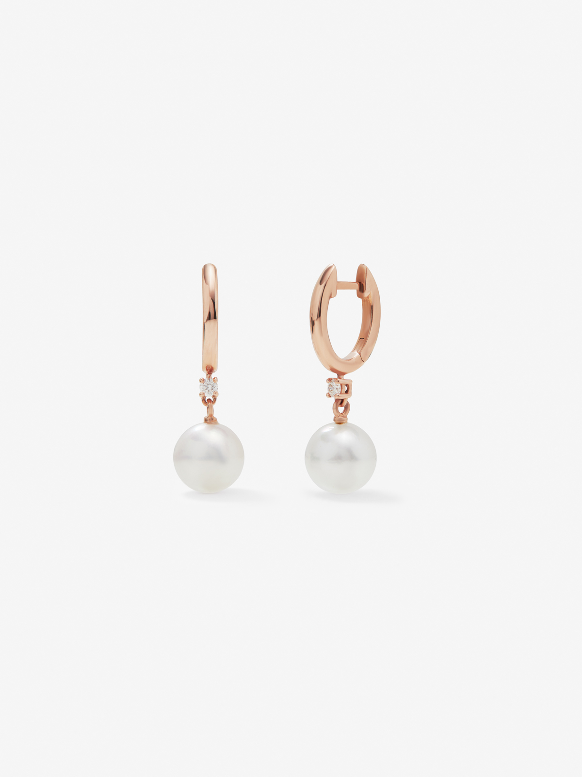 18k rose gold hoop earring with 8.5mm Australian pearl and diamond.