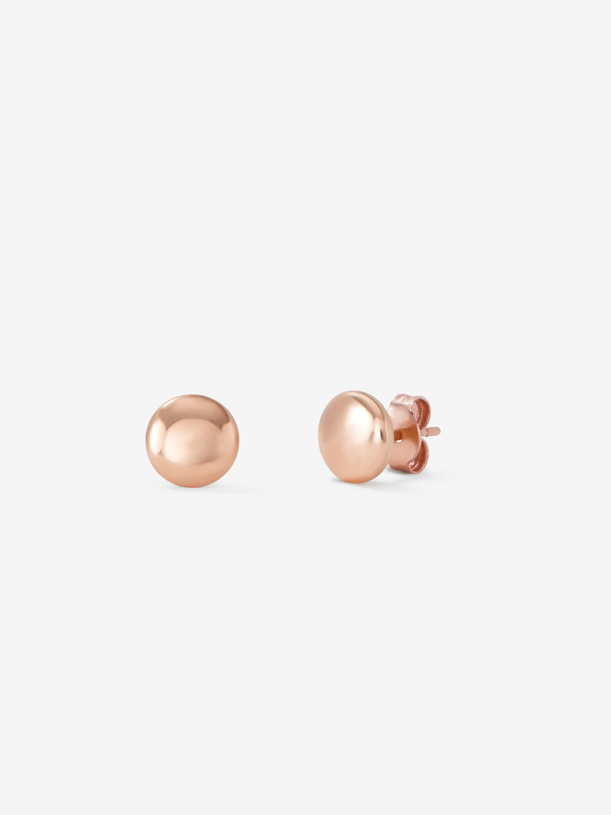 Medium-sized 18K rose gold button earrings.