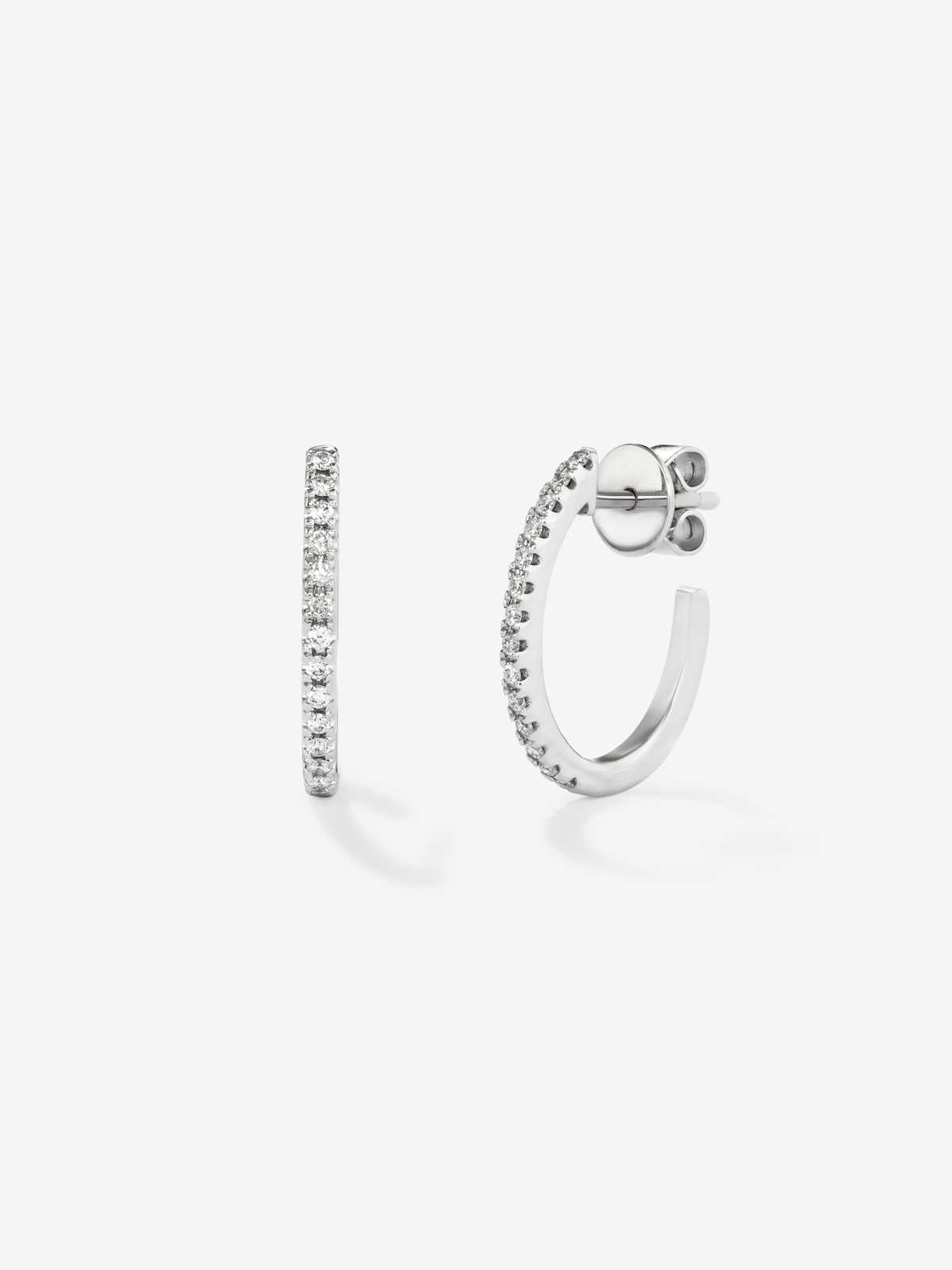 Thin hoop earrings made of 18K white gold with diamonds