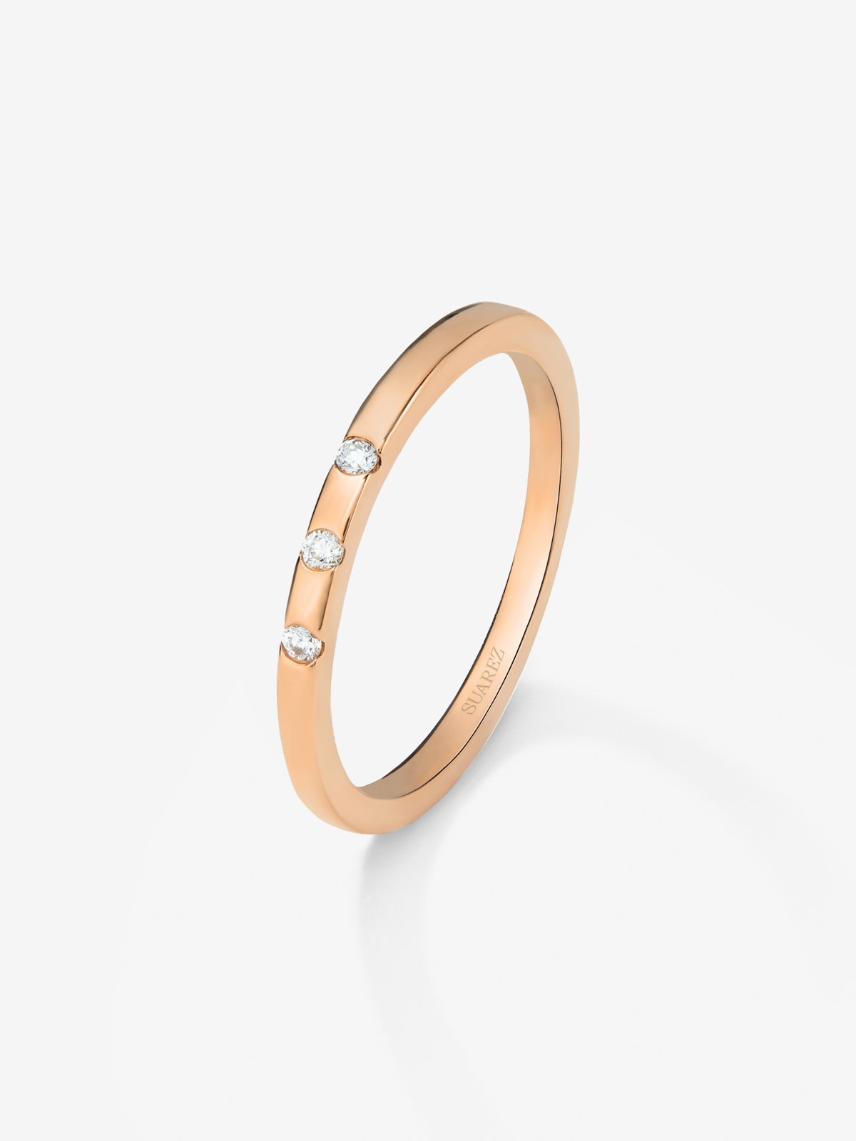 Anillo de oro rosa de 18K con 3 diamantes en talla brillante con un total de 1,4 cts