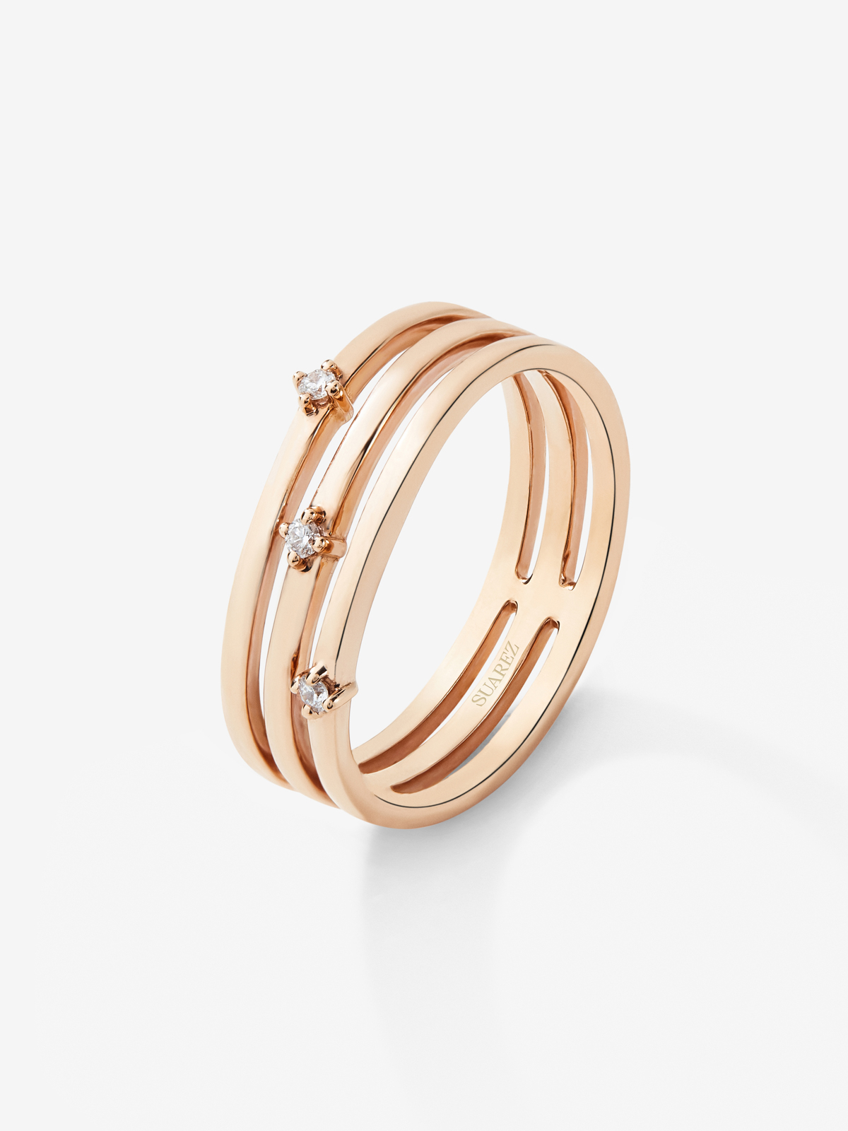 Anillo triple brazo de oro rosa de 18K con diamantes