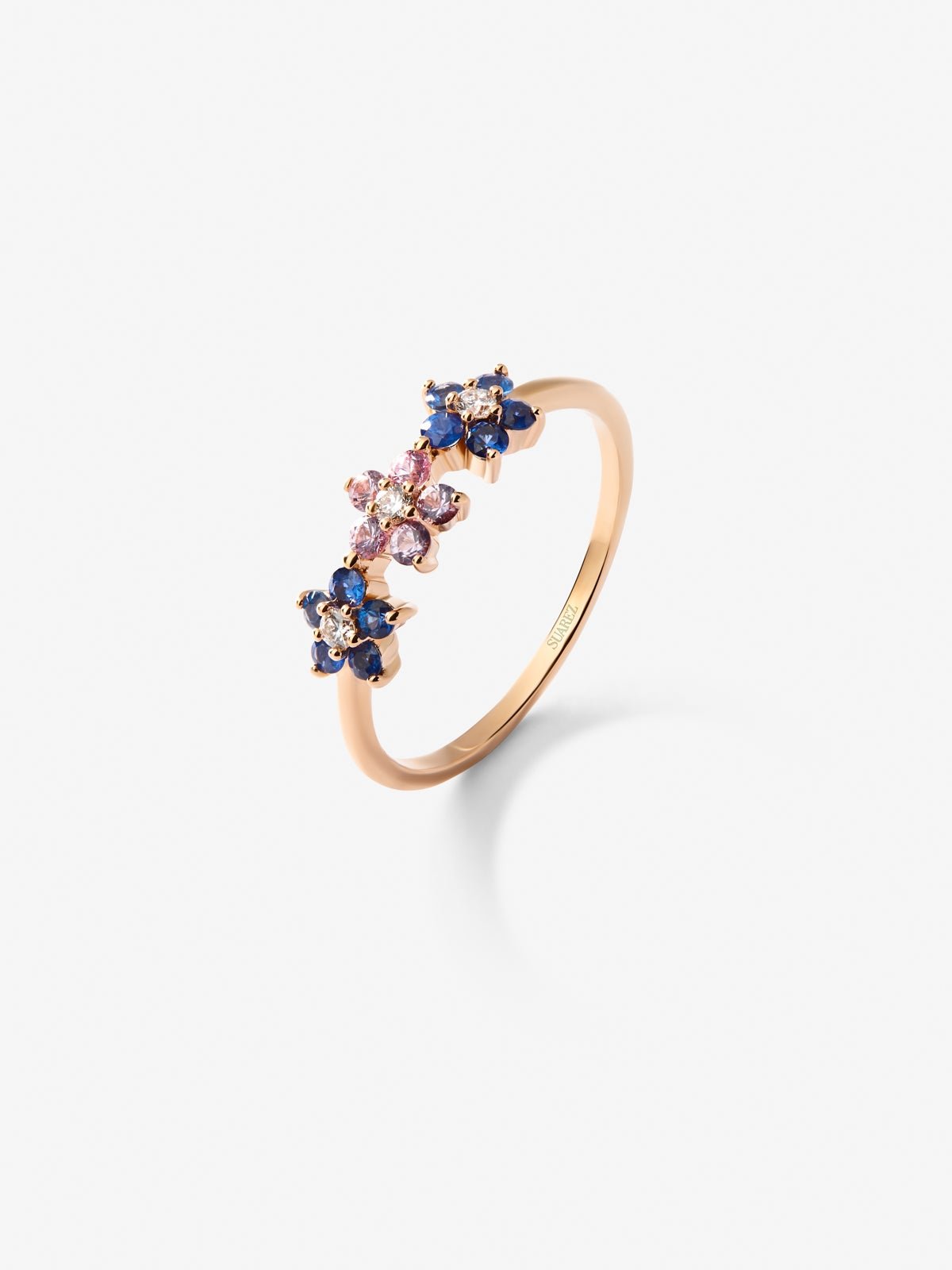 Anillo flores de oro rosa de 18kt con diamante y zafiros