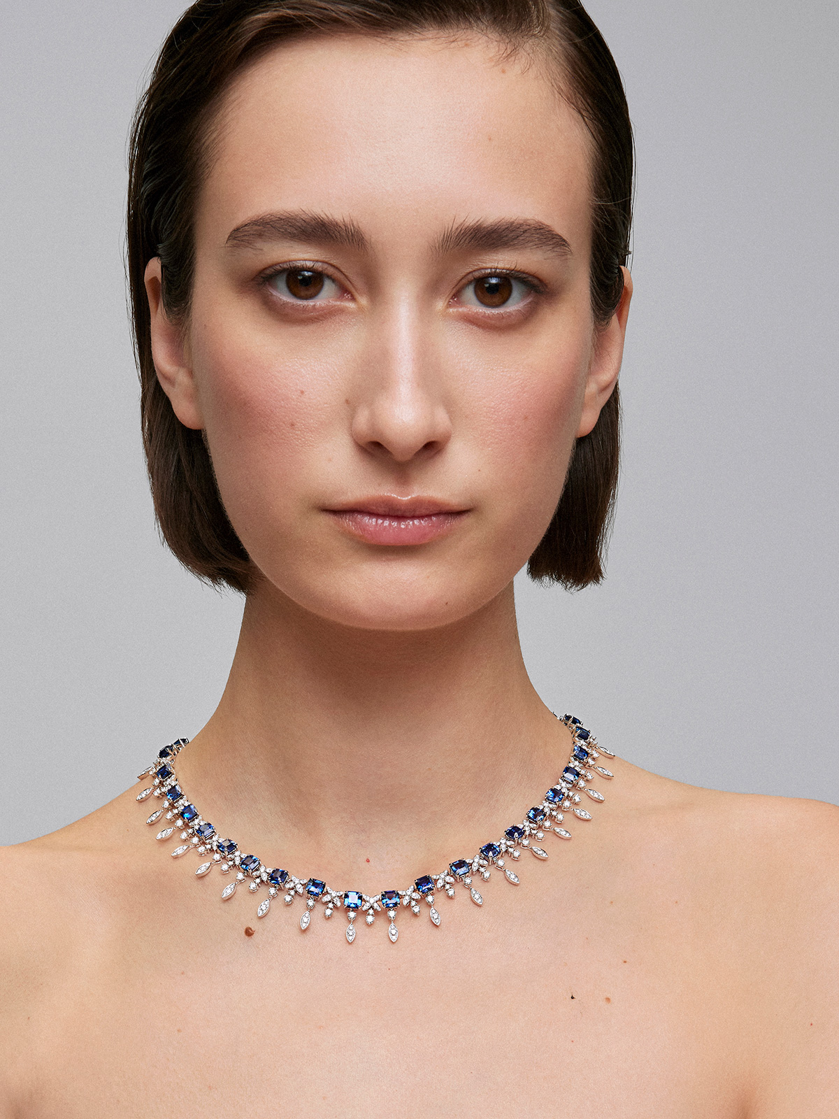 18K white gold necklace with blue sapphires in octagonal size 40.98 cts and white diamonds in 9.48 cts bright size