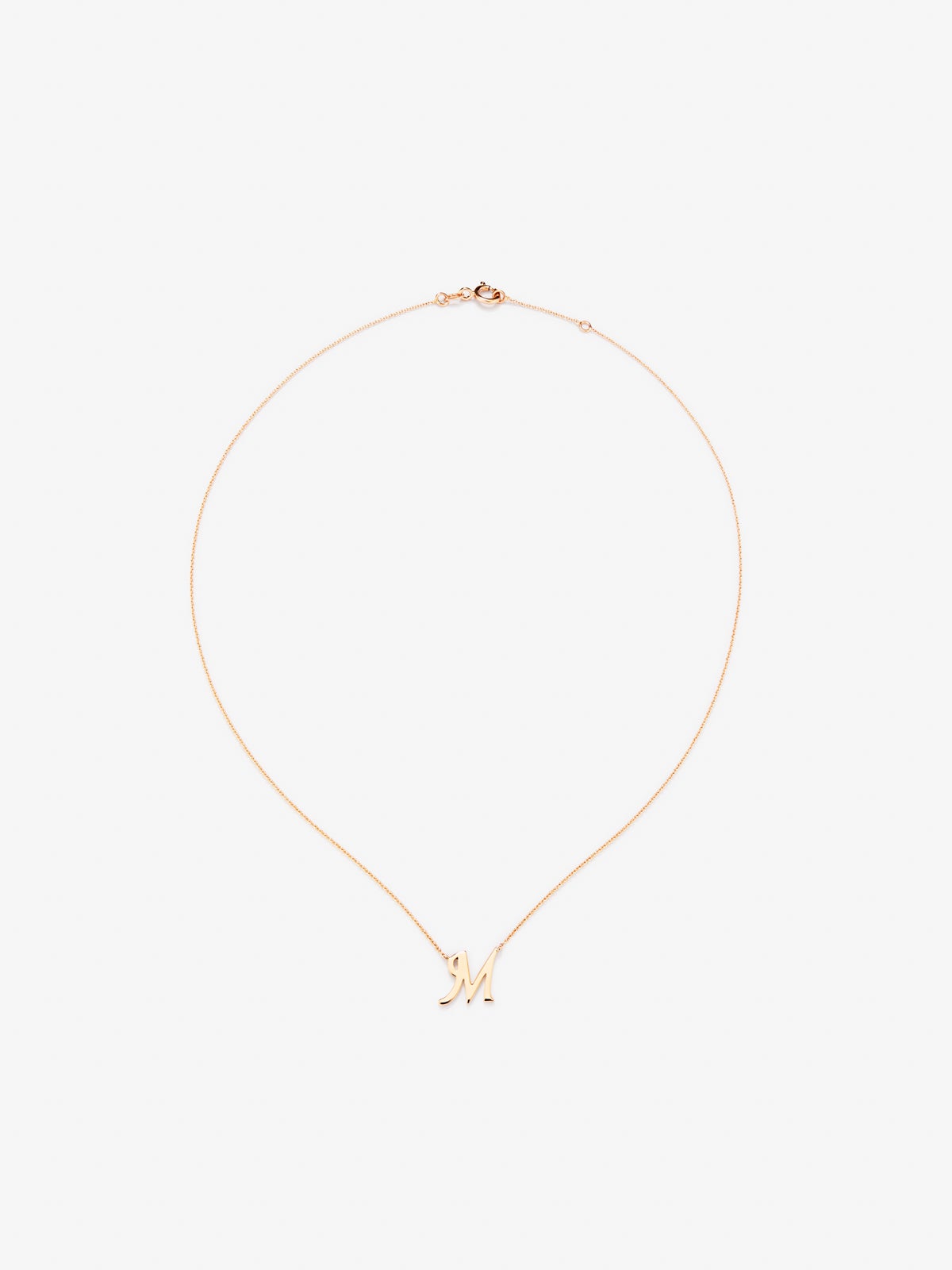 Colgante cadena con inicial m de oro rosa de 18K