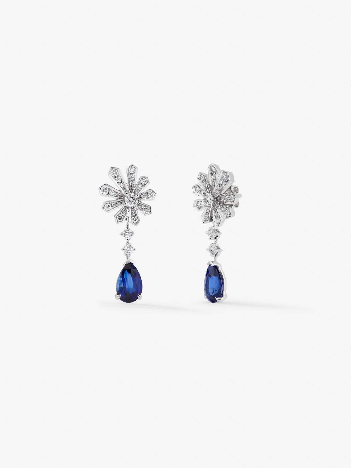 18K white gold earrings with royal blue sapping in 2.32 cts pear size, blue slope of 2.15 and 0.95 cts white diamonds