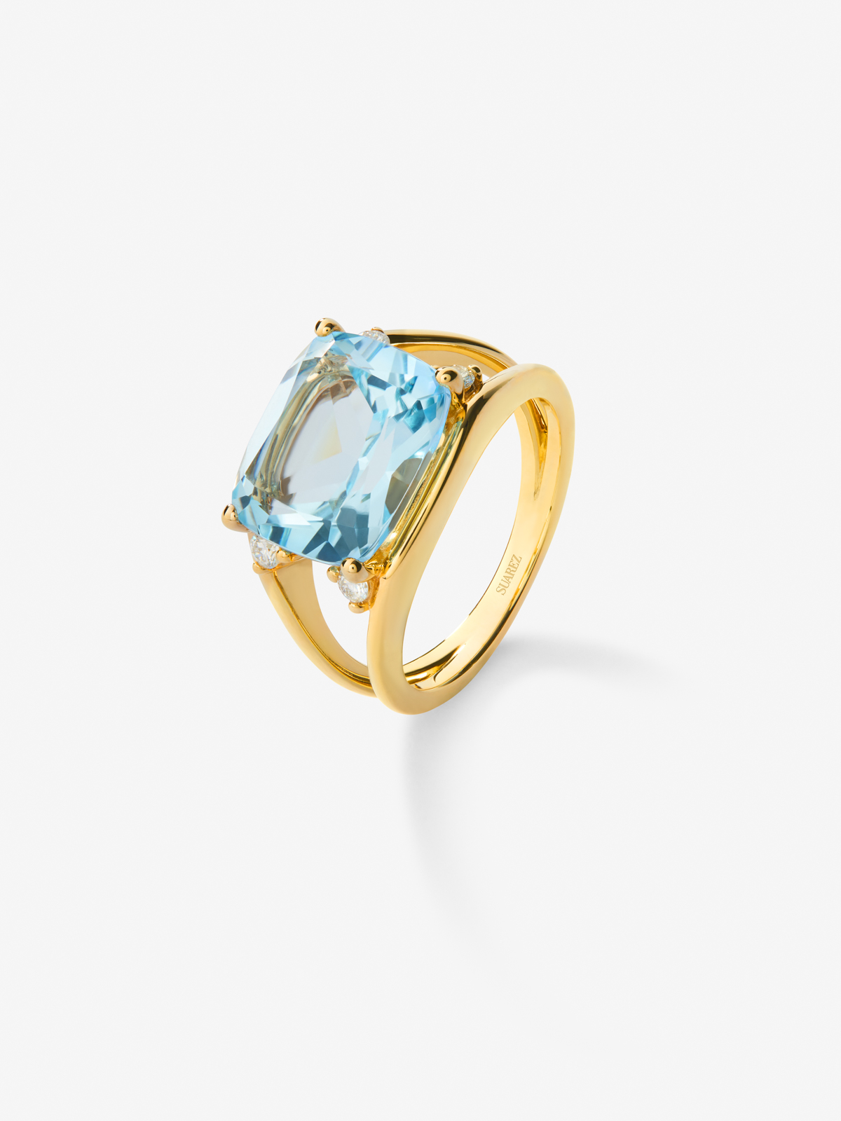 18k yellow gold ring with blue Sky Topacio in 7.3 cshion size and white diamonds in 0.13 cts bright diamonds