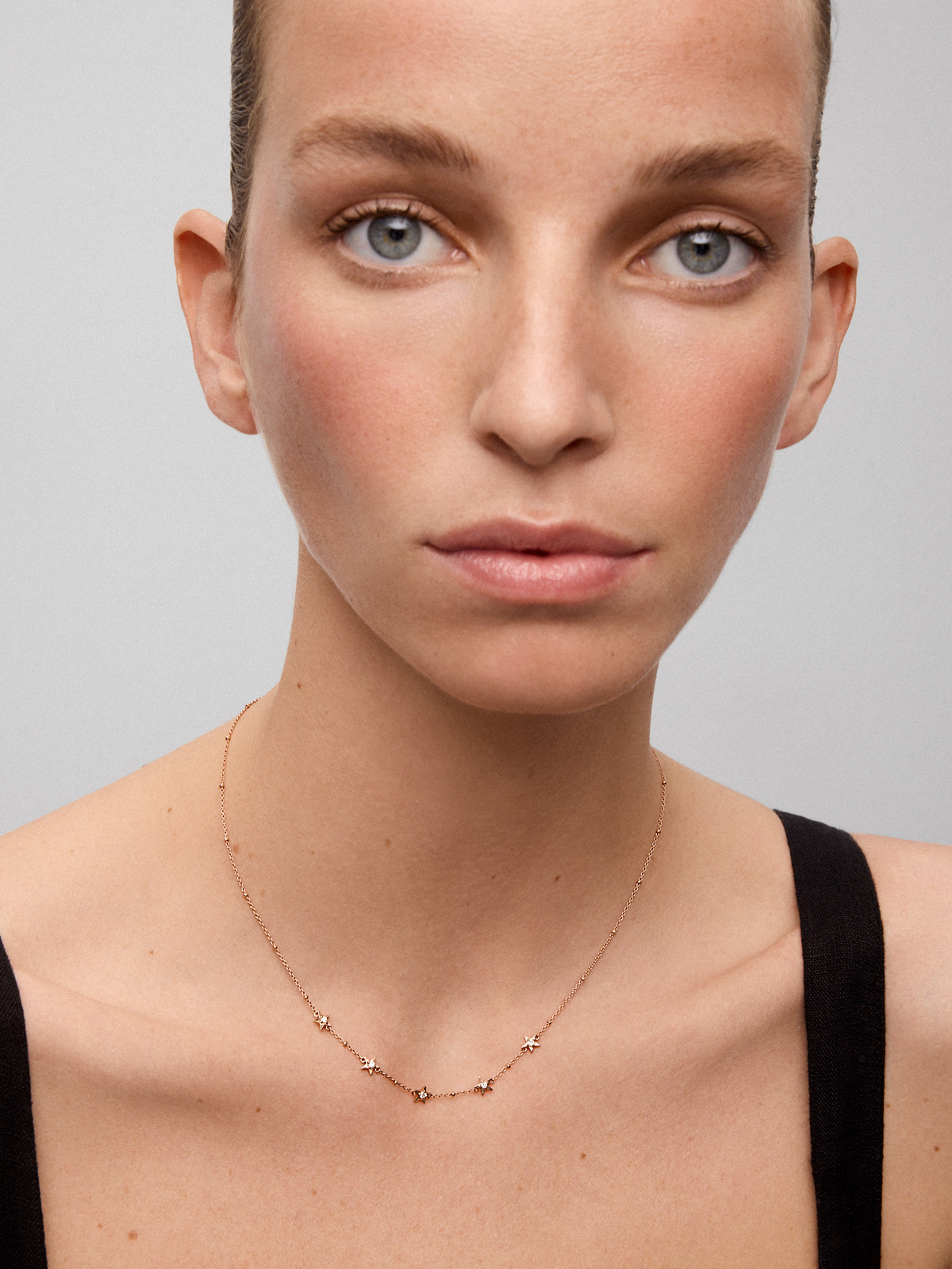 Colgante de oro rosa de 18kt con diamantes