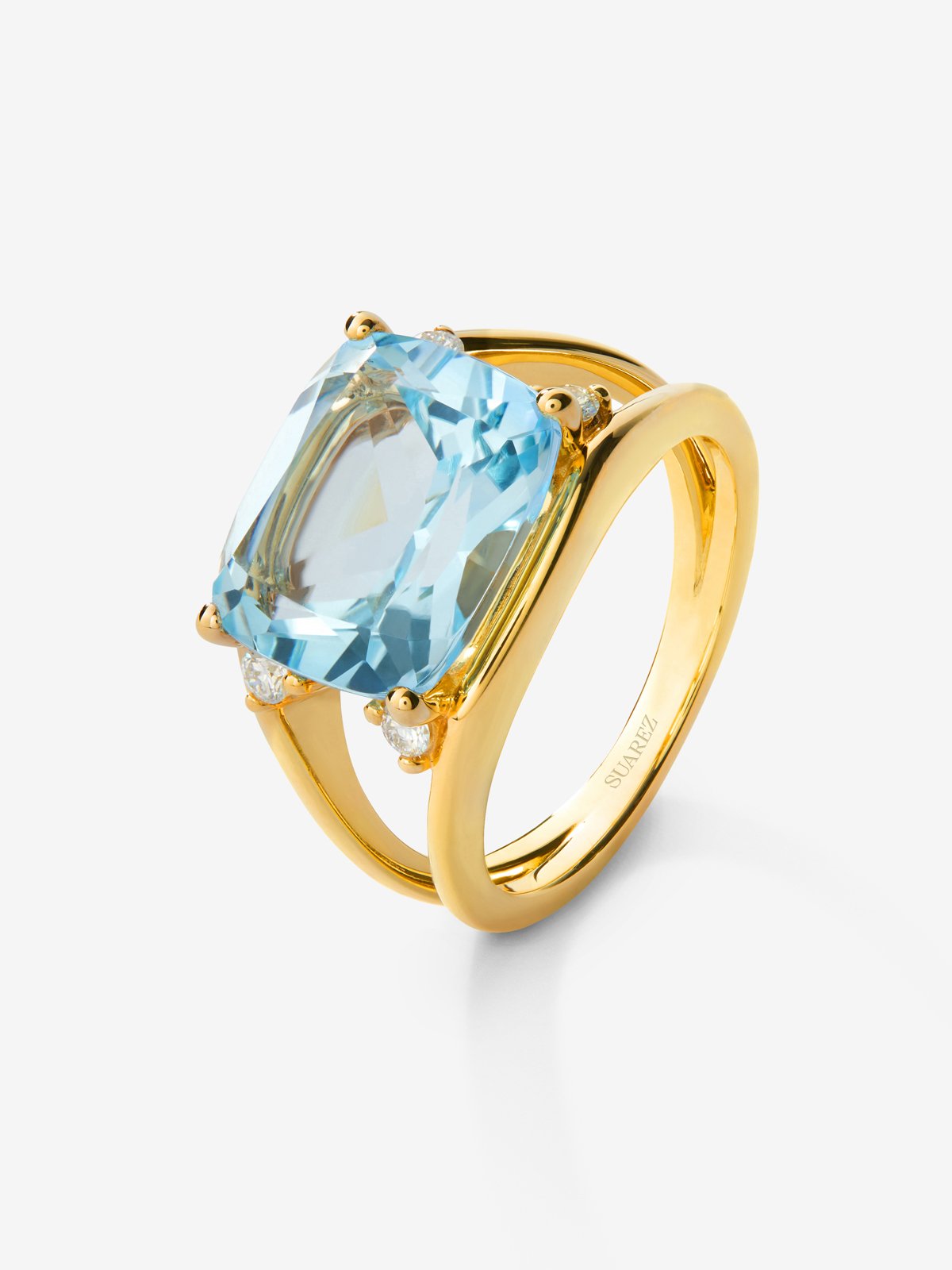 18k yellow gold ring with blue Sky Topacio in 7.3 cshion size and white diamonds in 0.13 cts bright diamonds