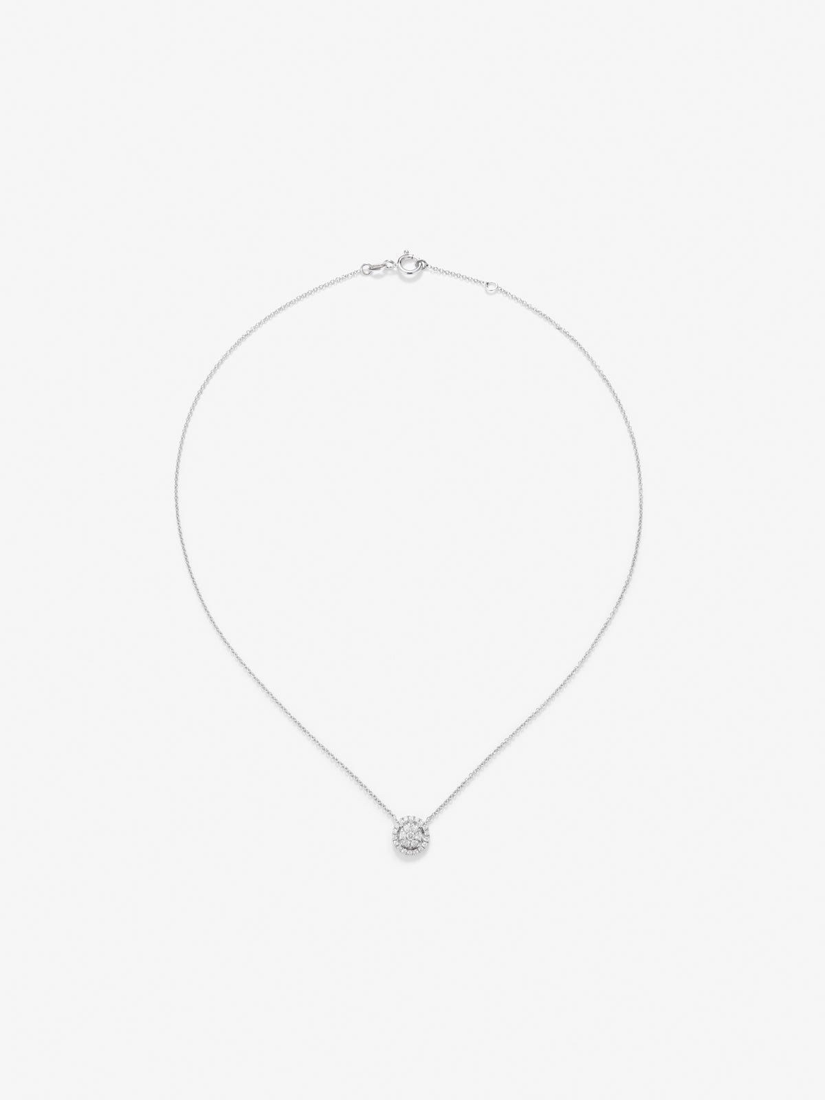 Colgante de oro blanco de 18K con 25 diamantes en talla brillantes con un total de 0,31 cts
