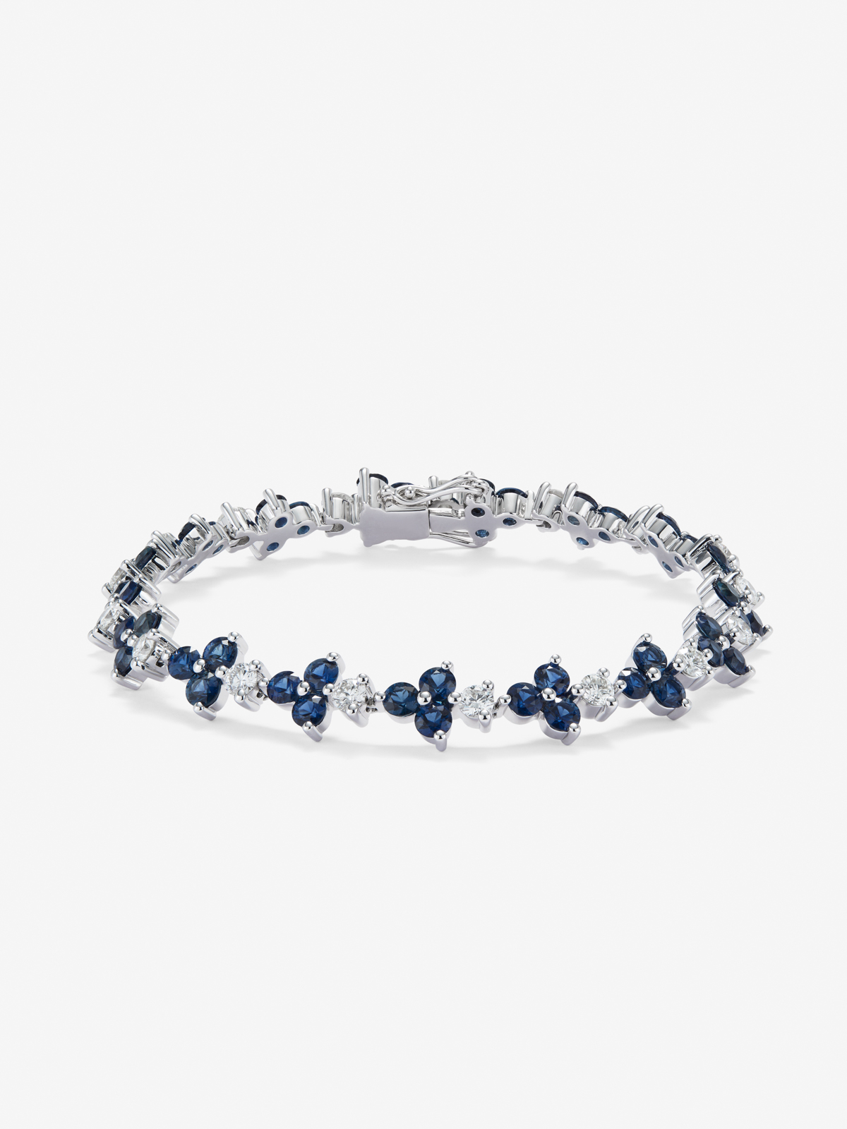 18K White Gold Rivière bracelet with Blue Zafiros in Blind Size 6.62 cts and White Diamonds in Bright Size of 2.85 CTS