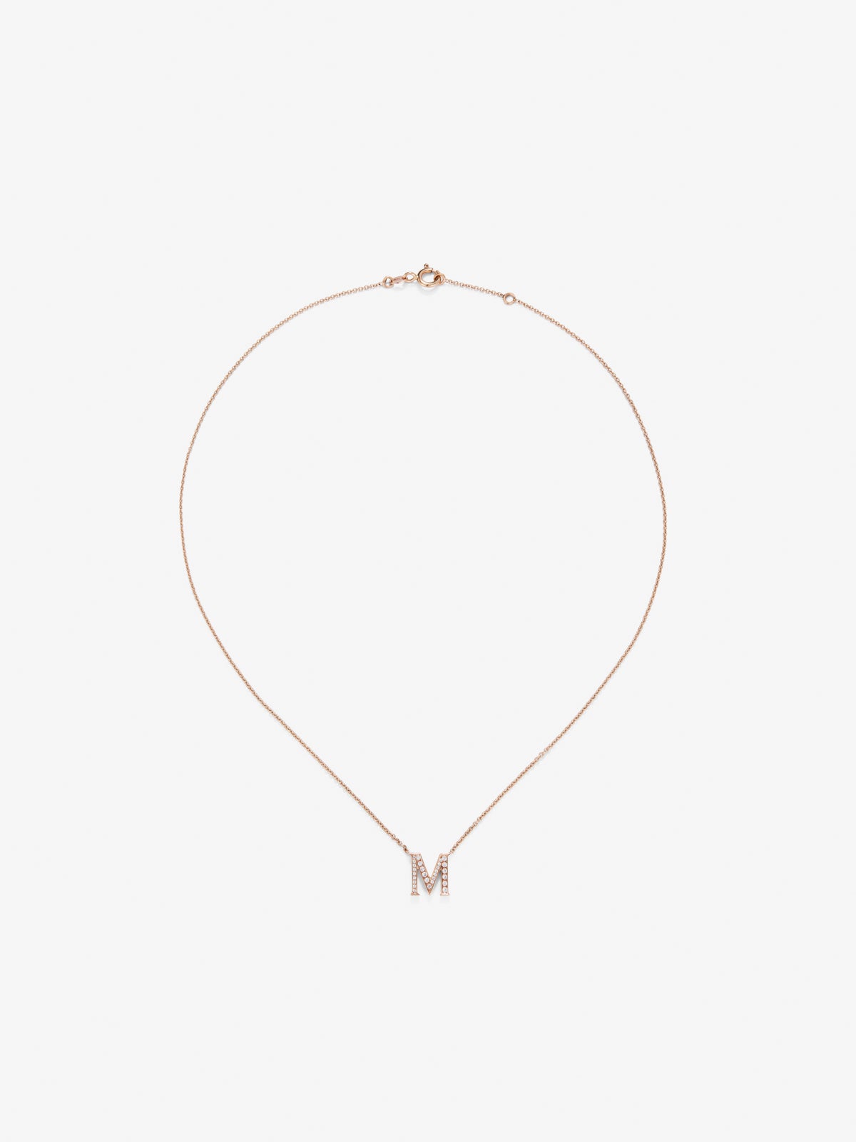 Colgante cadena con inicial de oro rosa de 18K y diamantes