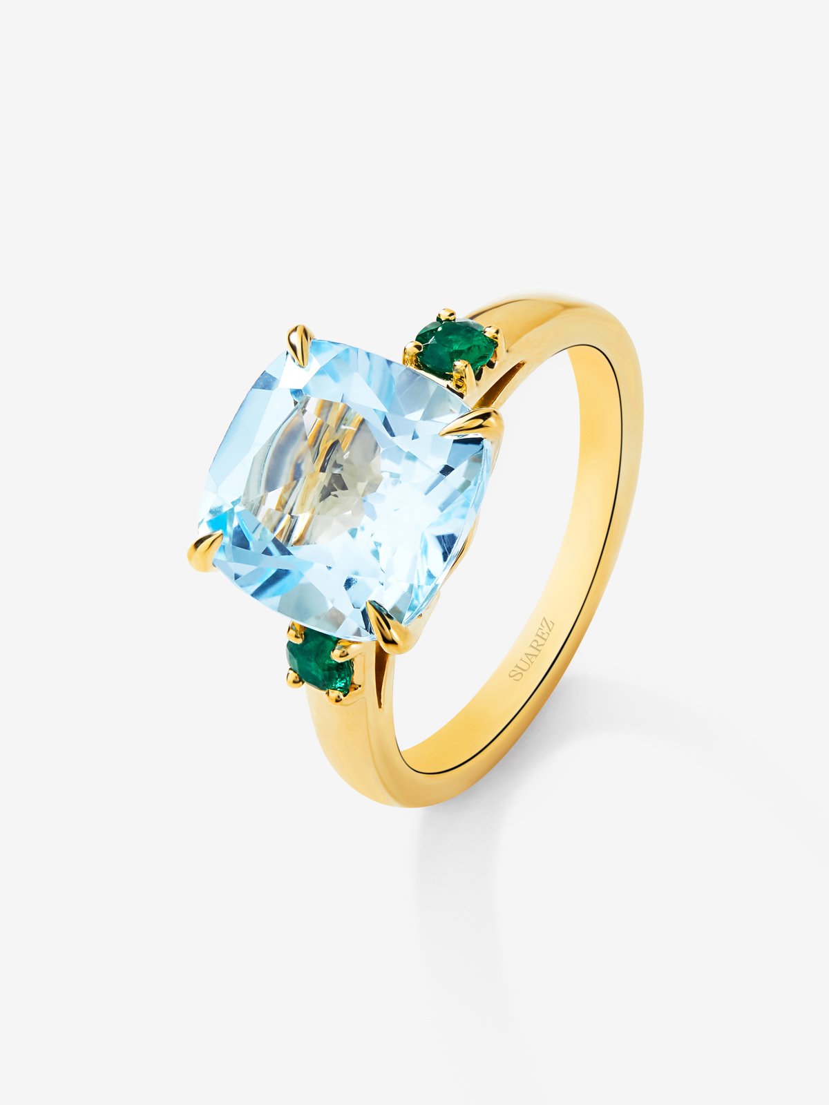 18K yellow gold triple ring with 4.88 ct cushion-cut sky blue topaz and 2 brilliant-cut green emeralds