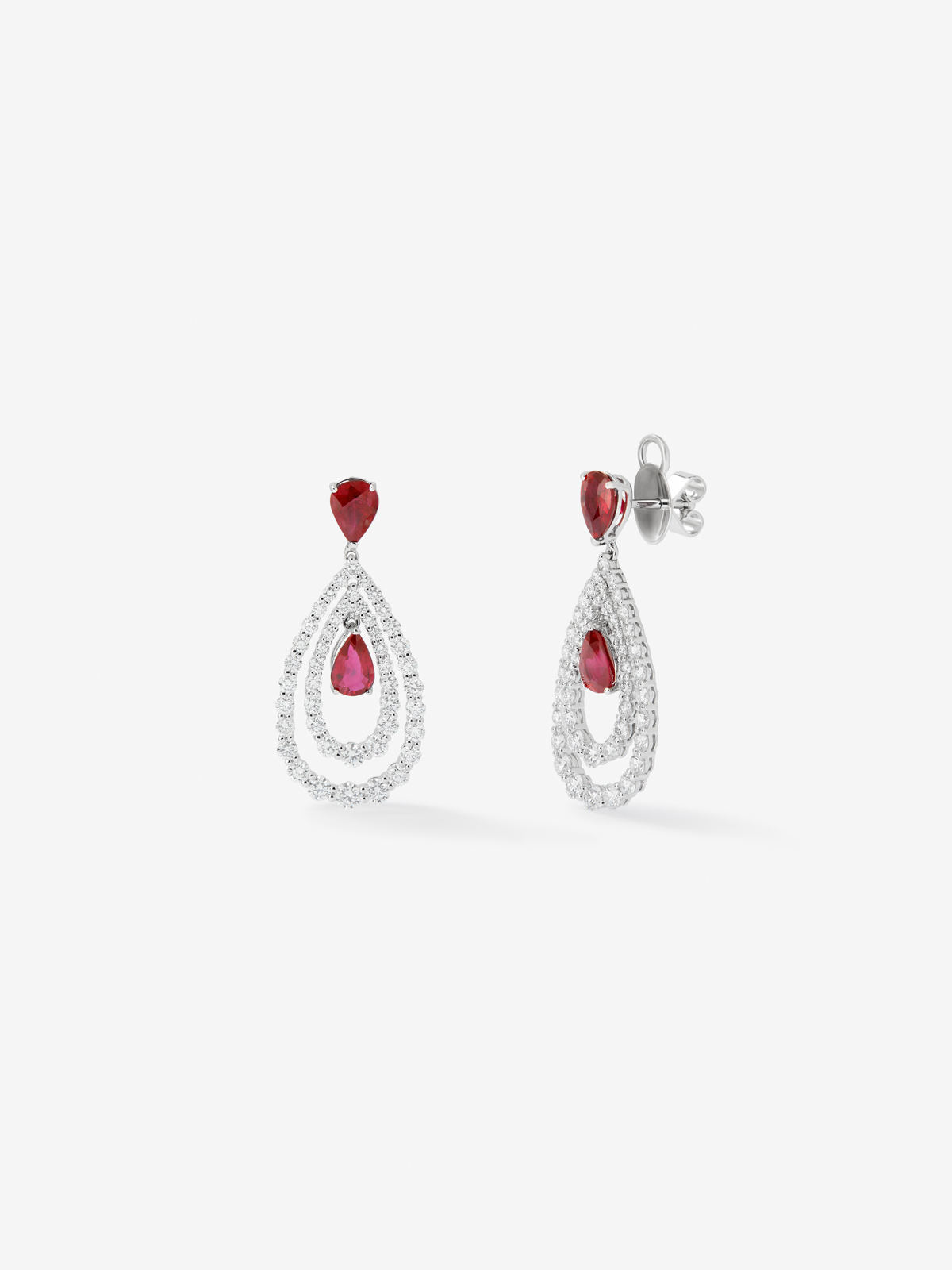 18K white gold earrings with white diamonds in bright size of 3 cts and red rubies in 3,13 cts pear size