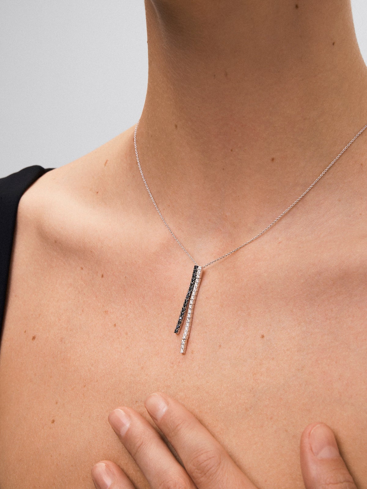 18K gold necklace with black diamond and white diamond